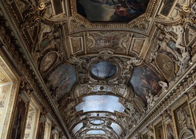 an eccentrically designed ceiling in the Louvre in Paris, France.